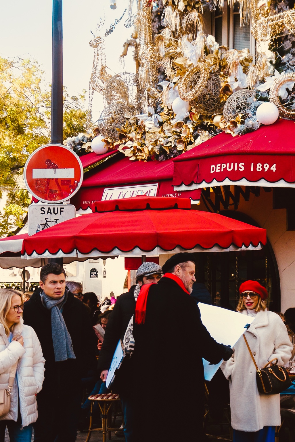 Street scene with a red market canopy